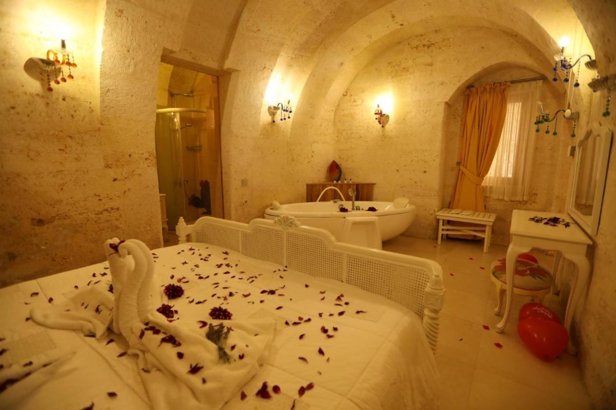 Anatelein Cave Hotel Учисар Номер фото