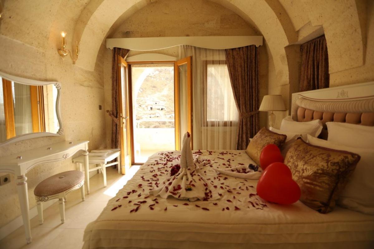 Anatelein Cave Hotel Учисар Номер фото